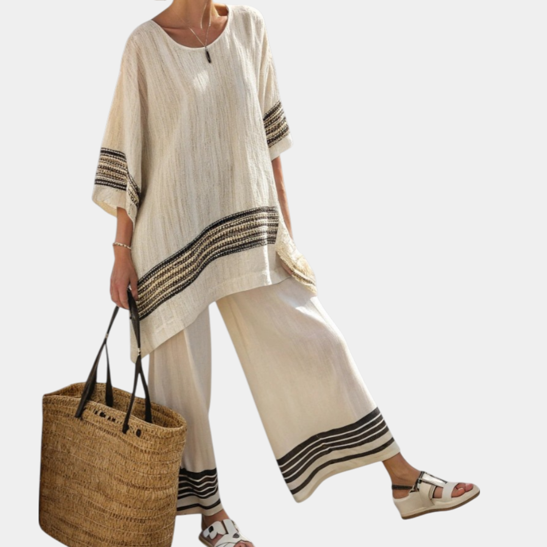 Mariella | Elegant top with black stripes and flowing trousers