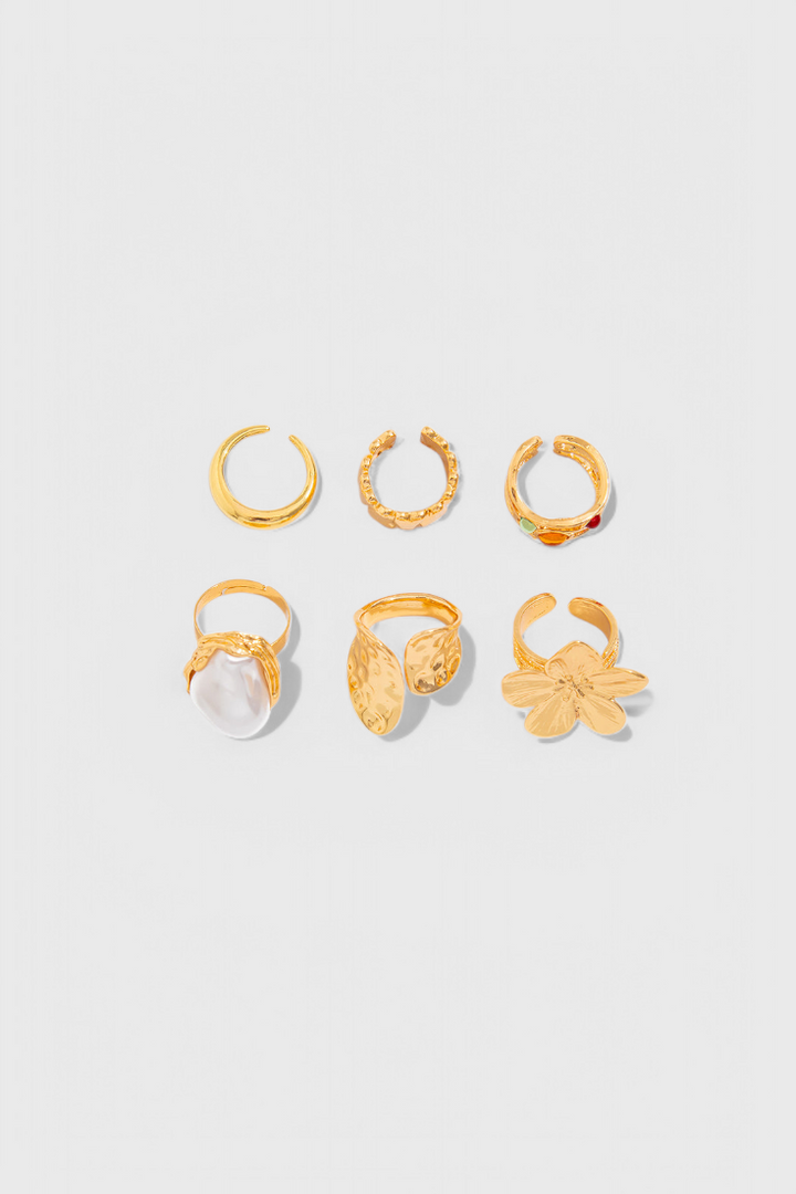Open Floral Shaped Ring of Flowing Pearl