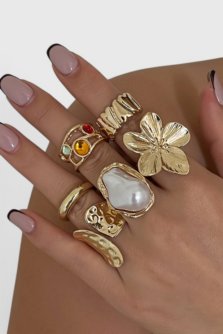 Open Floral Shaped Ring of Flowing Pearl