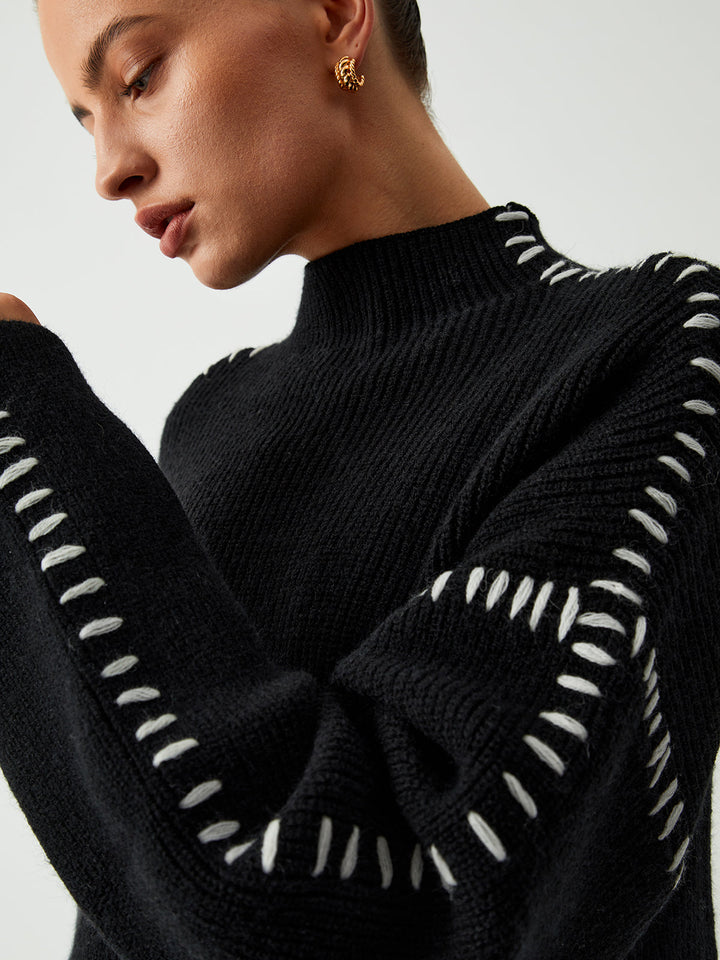 Alma | Oversized jumper with high collar and piqué details