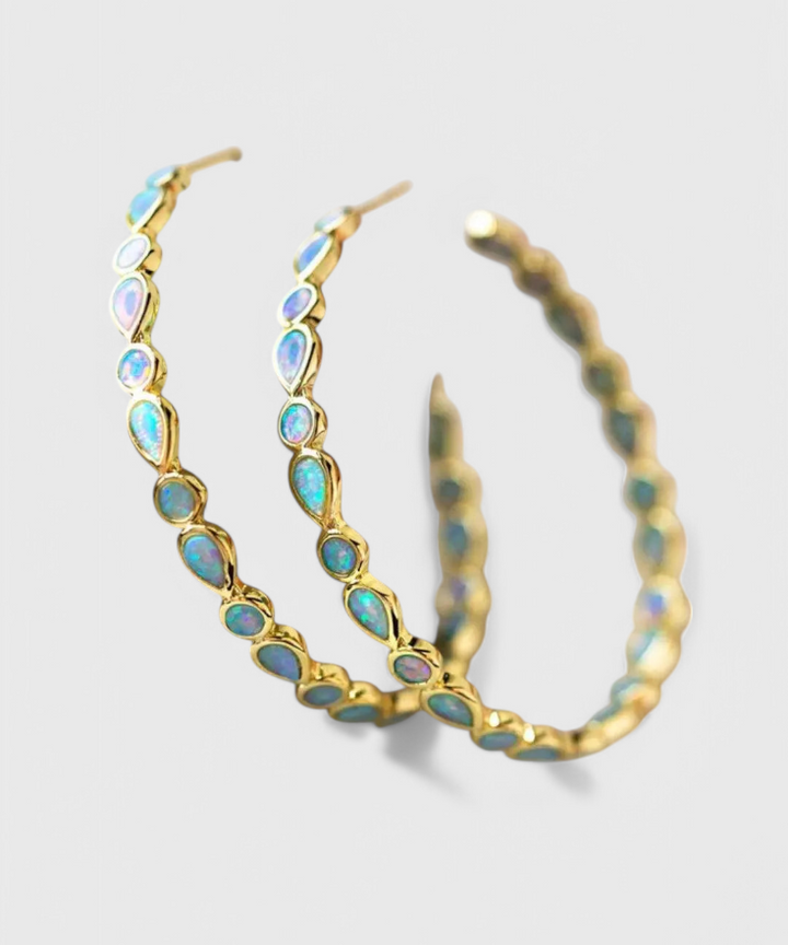 Vintage earrings in blue opal and gold