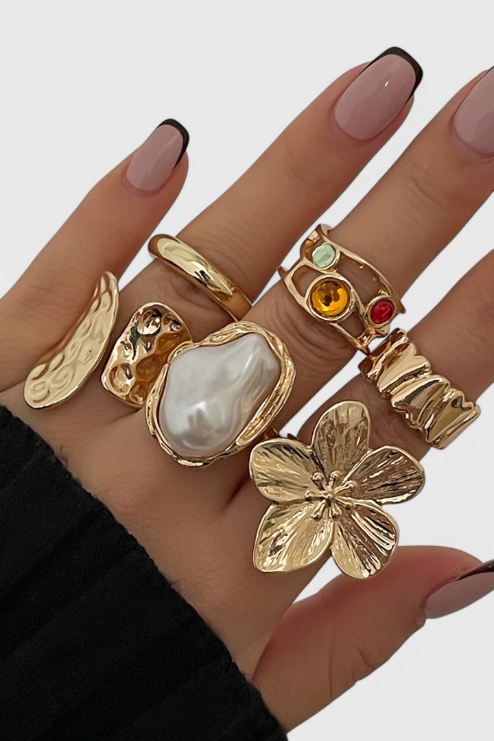 Open Floral Shaped Ring of Flowing Pearl